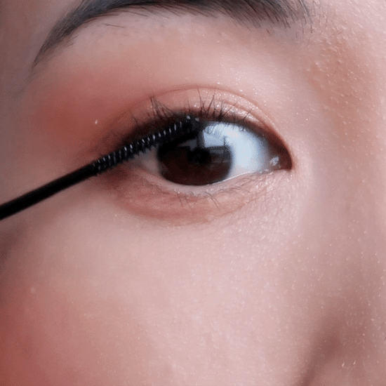 Applying DIY lash extension bond to natural lashes